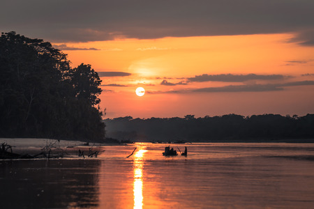 Manu National Park, Peru - August 09, 2017: Sunrise in the Amazon rainforest of Manu National Park, Peruのeditorial素材