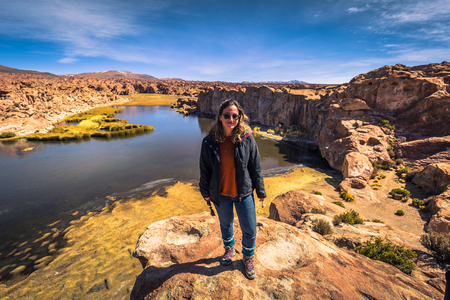 Eduardo Avaroa National Park - July 19, 2017: Traveler in the Black Lagoon in Eduardo Avaroa National Park, Boliviaのeditorial素材