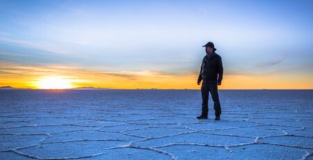 Uyuni Salt Flats - July 20, 2017: Tourist at the Uyuni Salt Flats at sunrise, Boliviaのeditorial素材