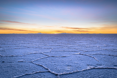 Landscape of the Uyuni Salt Flats at sunrise, Boliviaの写真素材