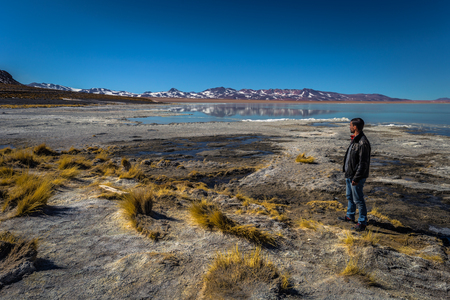 Eduardo Avaroa National Park - July 18, 2017: Tourist by the Polques Hot Springs in Eduardo Avaroa National Park, Boliviaのeditorial素材