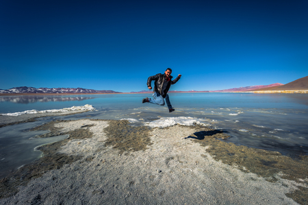 Eduardo Avaroa National Park - July 18, 2017: Tourist by the Polques Hot Springs in Eduardo Avaroa National Park, Boliviaのeditorial素材