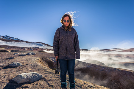 Eduardo Avaroa National Park - July 18, 2017: Tourist in the Morning Sun Geysers in Eduardo Avaroa National Park, Boliviaのeditorial素材