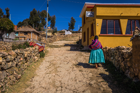 Sun Island - July 28, 2017: Local lady in Sun Island in lake Titicaca, Boliviaのeditorial素材