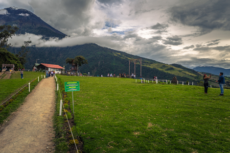 Baños - August 19, 2018: Casa de Arbol swing in Baños, Ecuadorのeditorial素材
