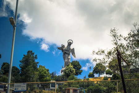 Quito - August 17, 2018: El Panecillo landmark seen fom the centrer of Quito, Ecuadorのeditorial素材