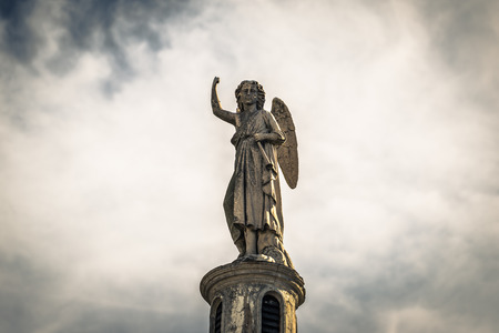 Buenos Aires - July 01, 2017: Religious statue at the Recoleta cemetery in Buenos Aires, Argentinaのeditorial素材