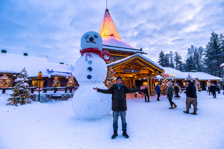 Rovaniemi - December 16, 2017: Travelers in the Santa Claus village of Rovaniemi, Finlandのeditorial素材