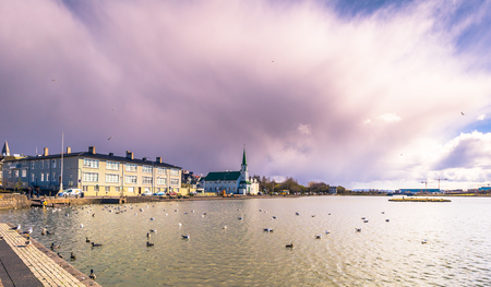 Reykjavik - May 02, 2018: Panorama of Reykjavik from the Tjornin Lake, Icelandのeditorial素材