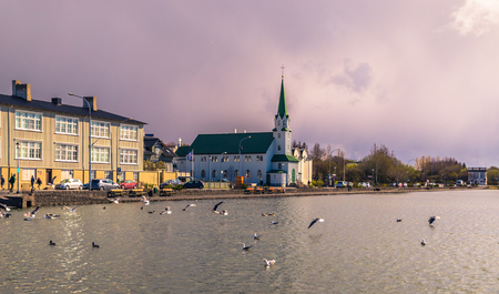 Reykjavik - May 02, 2018: Panorama of Reykjavik from the Tjornin Lake, Icelandのeditorial素材