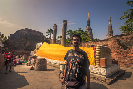 Ayutthaya - October 15, 2014: Statue of a giant reclining Buddha in the historic city of Ayutthaya, Thailandのeditorial素材