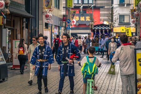 Tokyo - May 19, 2019: People celebrating the Sanja Matsuri festival in traditional clothes in Asakusa, Tokyo, Japanのeditorial素材