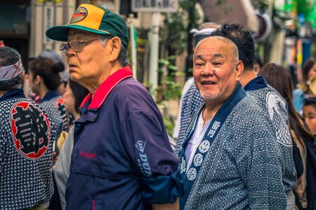 Tokyo - May 19, 2019: People celebrating the Sanja Matsuri festival in traditional clothes in Asakusa, Tokyo, Japanのeditorial素材