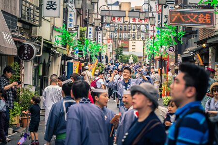 Tokyo - May 19, 2019: People celebrating the Sanja Matsuri festival in traditional clothes in Asakusa, Tokyo, Japanのeditorial素材