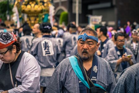Tokyo - May 19, 2019: People celebrating the Sanja Matsuri festival in traditional clothes in Asakusa, Tokyo, Japanのeditorial素材