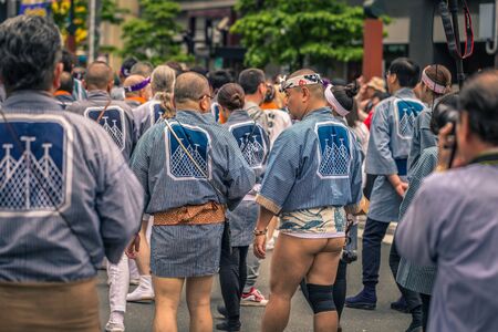 Tokyo - May 19, 2019: People celebrating the Sanja Matsuri festival in traditional clothes in Asakusa, Tokyo, Japanのeditorial素材