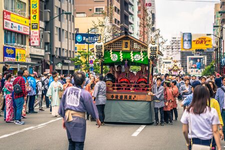 Tokyo - May 19, 2019: People celebrating the Sanja Matsuri festival in traditional clothes in Asakusa, Tokyo, Japanのeditorial素材