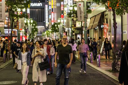Tokyo - May 19, 2019: People in the streets of Shinjuku, Tokyo, Japanのeditorial素材