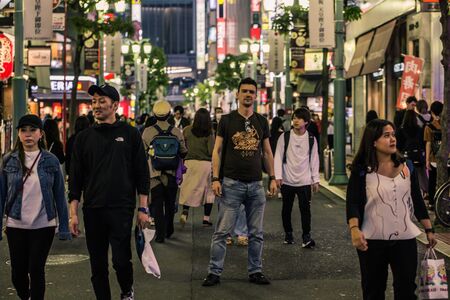 Tokyo - May 19, 2019: People in the streets of Shinjuku, Tokyo, Japanのeditorial素材