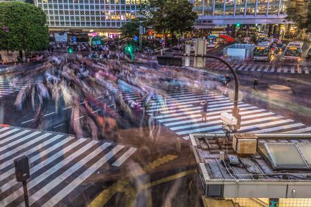 Tokyo - May 21, 2019: The scramble crossing in the district of Shibuya in Tokyo, Japanのeditorial素材