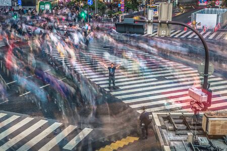 Tokyo - May 21, 2019: The scramble crossing in the district of Shibuya in Tokyo, Japanのeditorial素材