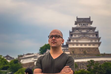Himeji - June 02, 2019: Western traveler in the iconic Himeji Castle in the region of Kansai, Japanのeditorial素材