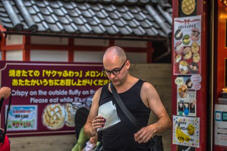 Nara - May 31, 2019: Tourists in the streets of Nara, Japanのeditorial素材