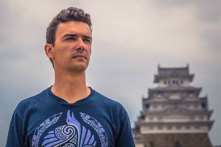 Himeji - June 02, 2019: Western traveler in the iconic Himeji Castle in the region of Kansai, Japanのeditorial素材