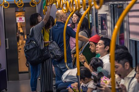 Osaka - June 01, 2019: Japanese people communting in the subway of Osaka, Japanのeditorial素材