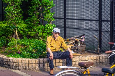 Osaka - June 01, 2019: Old japanese man in the streets of Osaka, Japanのeditorial素材