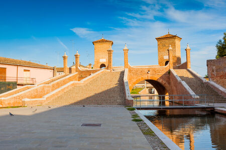 Trepponti or Ponte della Pallotta, XVII century brick bridge in Comacchio,  province of Ferrara, Emilia Romagna, Italyの写真素材