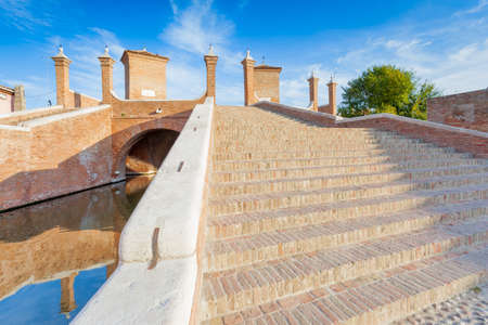 Trepponti or Ponte della Pallotta, XVII century brick bridge in Comacchio,  province of Ferrara, Emilia Romagna, Italyの写真素材