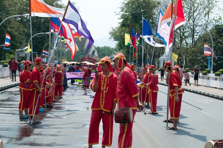 CHIANG MAI, THAILAND - APRIL 13:Undentified beautiful with traditionally dressed woman in parade on Songkran Festival on April 13, 2012 in Chiang Mai, Thailand のeditorial素材