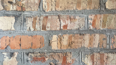 Brick red wall background of a oldの写真素材