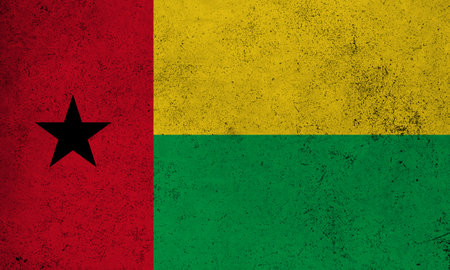 Abstract grunge textured vintage flag of Guinea-Bissauの写真素材