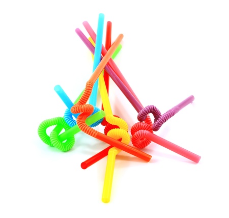 colorful drinking straws on a white backgroundの写真素材