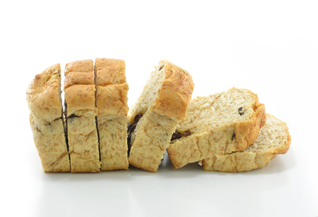 Sliced raisin bread isolated on white backgroundの写真素材