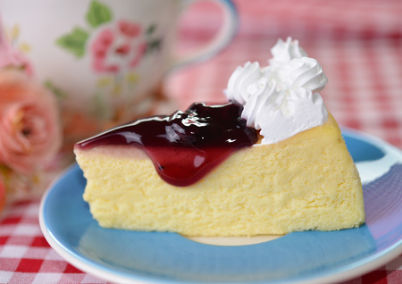 Blue Berry Cheese Cake on blue plate の写真素材