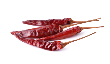 Dried red hot peppers chillies isolated on white.の写真素材