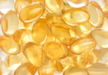 Cod liver oil omega 3 gel capsules isolated on white background