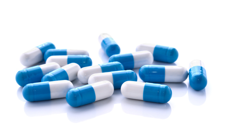 close up of pills capsule isolated on white backgroundの写真素材