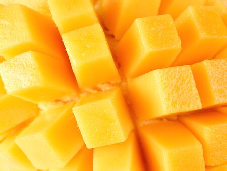 Closeup slice of mango backgroundの写真素材