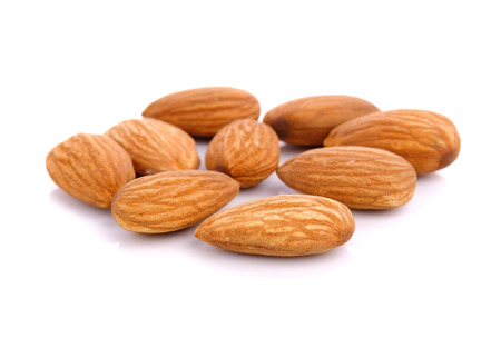 almond nuts isolated on white backgroundの写真素材