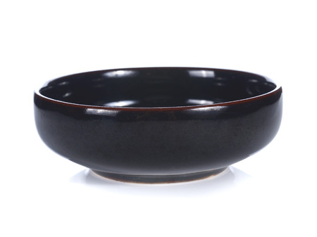 black bowl isolated on whiteの写真素材