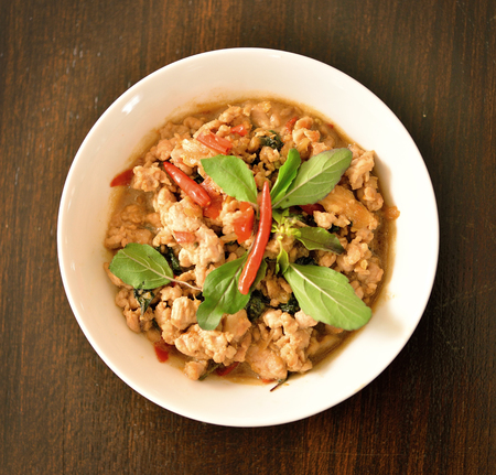 Rice topped with stir-fried pork and basil thai food, blurの写真素材