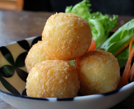 cheese ball in white plateの写真素材