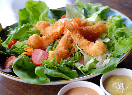 Fried Shrimp Salad on white backgroundの写真素材