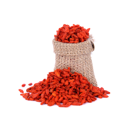 red dried goji berries ( Lycium Barbarum , wolfberry ) on whiteの写真素材