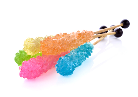 colorful sugar crystal candy on wooden stickの写真素材