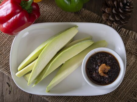 Green Mangoes with Sweet fish sauceの写真素材